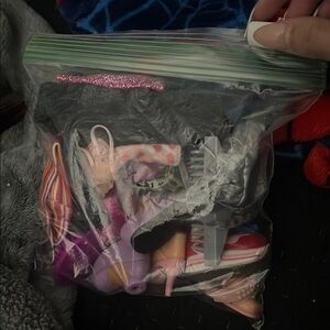 Assorted Doll Clothes and Accessories